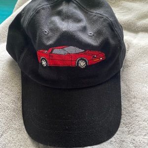Black hat red Camero